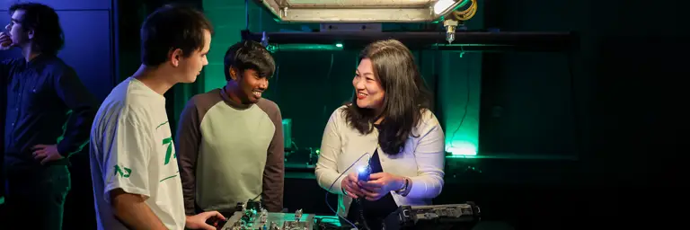 UND Physics Students with Professor Hands-On Learning