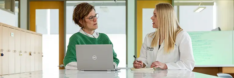 two people talking in a session 