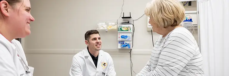 NP's in clinic setting with patient