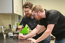 Two people working in lab