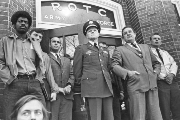 personnel standing in front of the Armory