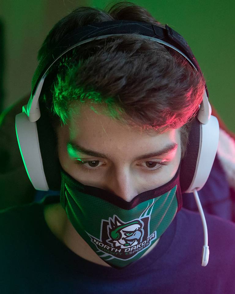 und student participating in esports