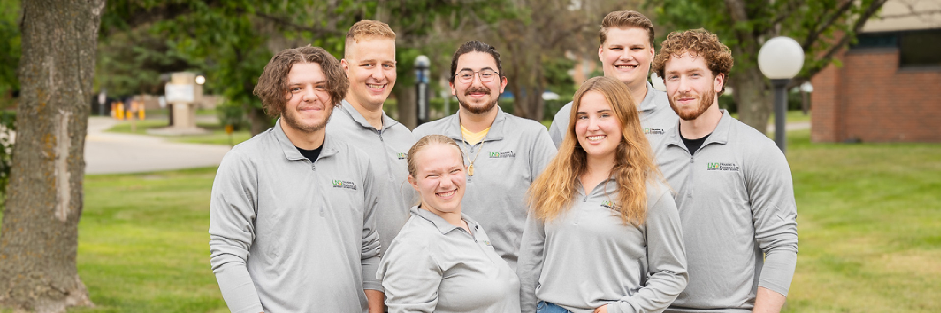 resident managers smiling together in a group