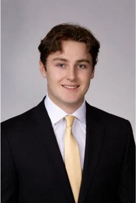 Brody Rohrich headshot dark suit