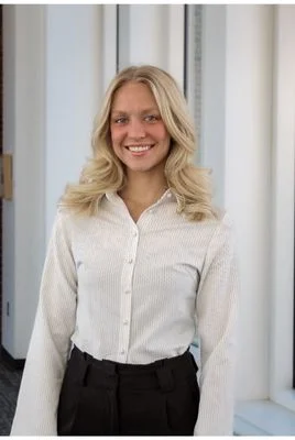 Brooklyn Brouse in white blouse