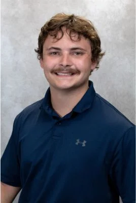 Dawson Beck in blue shirt