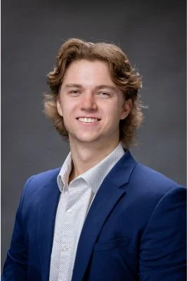 Edison Lunski in a navy suit