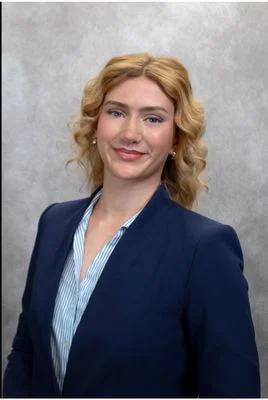 Maggie Fitzgerald in navy blazer