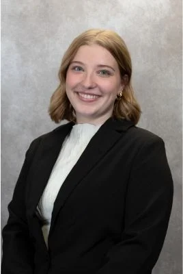 Merris Lindsay in a black suit