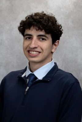 Omar Jozilan in navy sweater