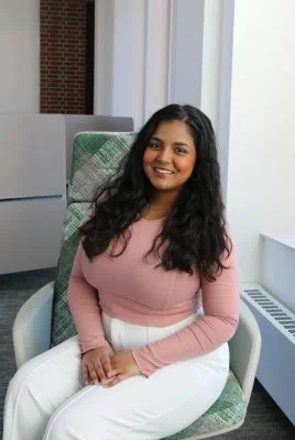 Tanushri Tallimani photo in pink top and white pants