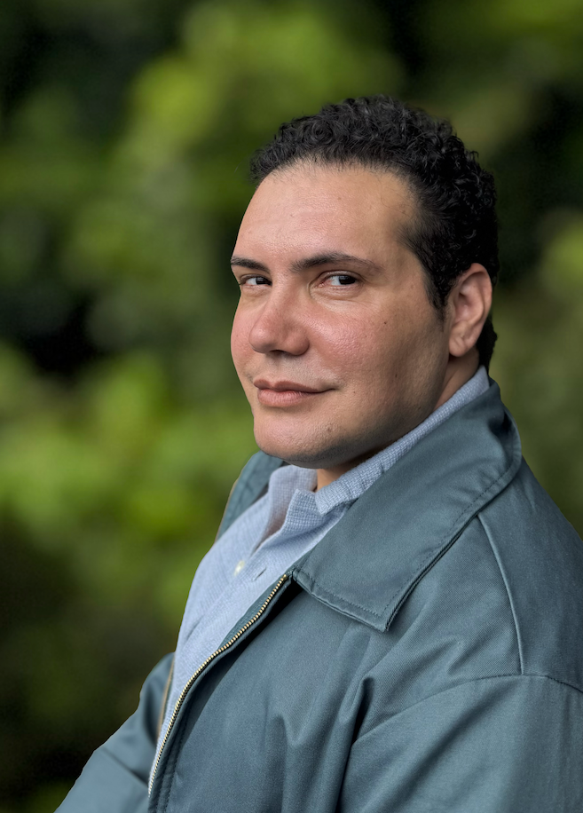Author photo of Roque Raquel Salas Rivera, looking directly to camera